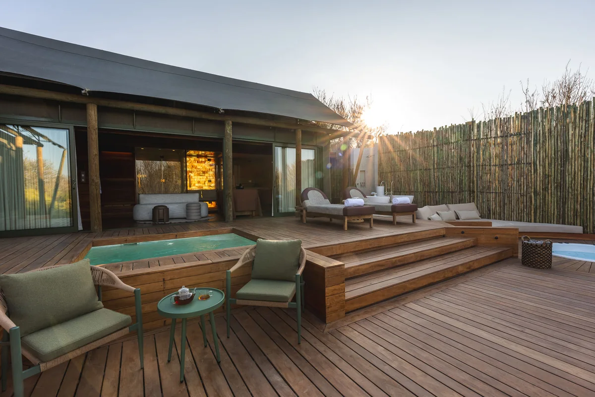 Suite terrace with loungers and plunge pool in the sun