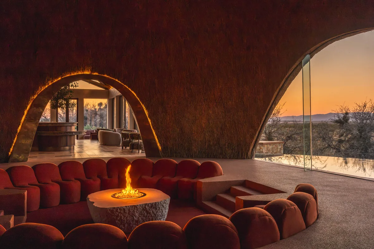 Fire burning at the centre of the sunken lounge