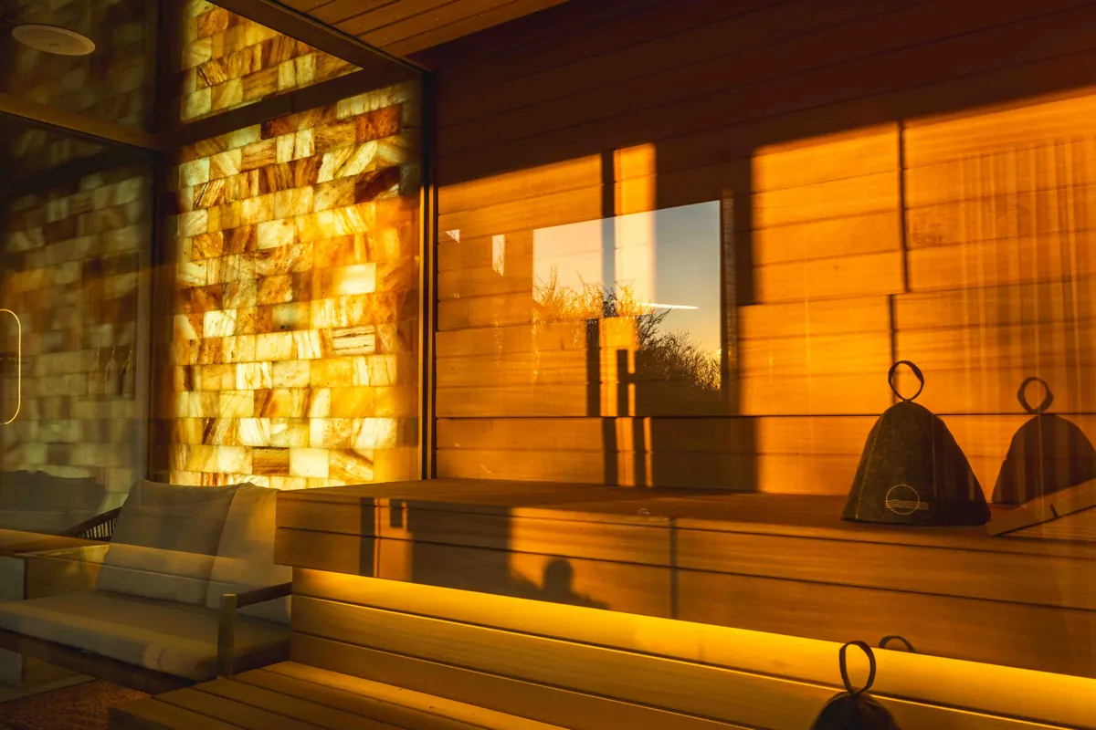 A treatment room lit by a wall of salt